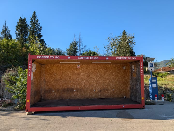 An empty container on a parking lot